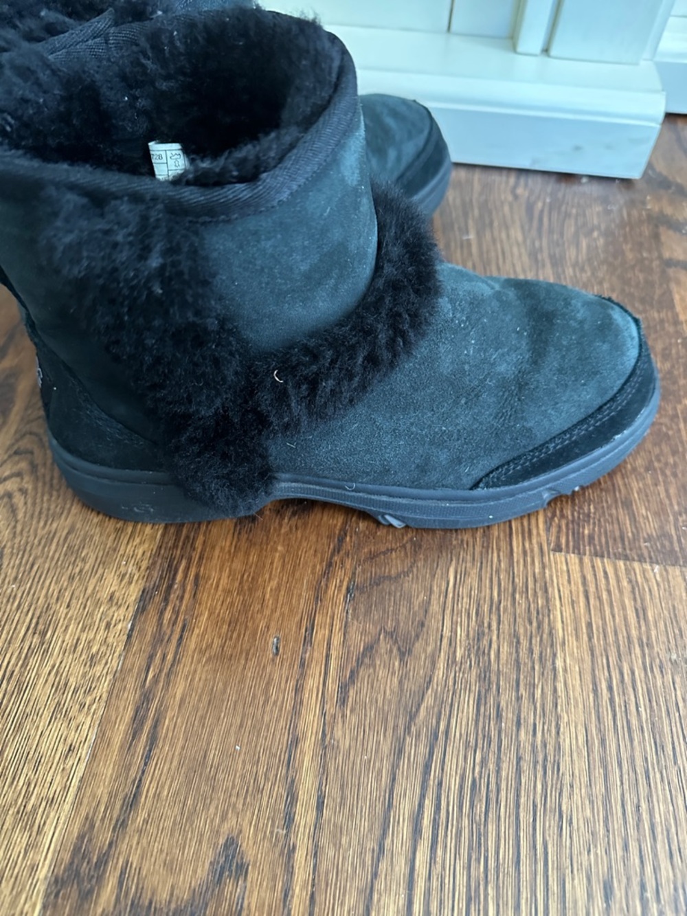 UGG Black Short Shearling Boot with Pom Detail - Picture 4 of 10